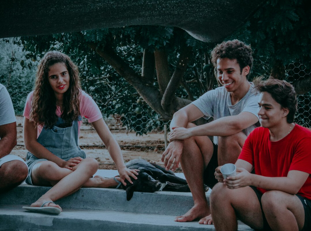 parents discussing with teen